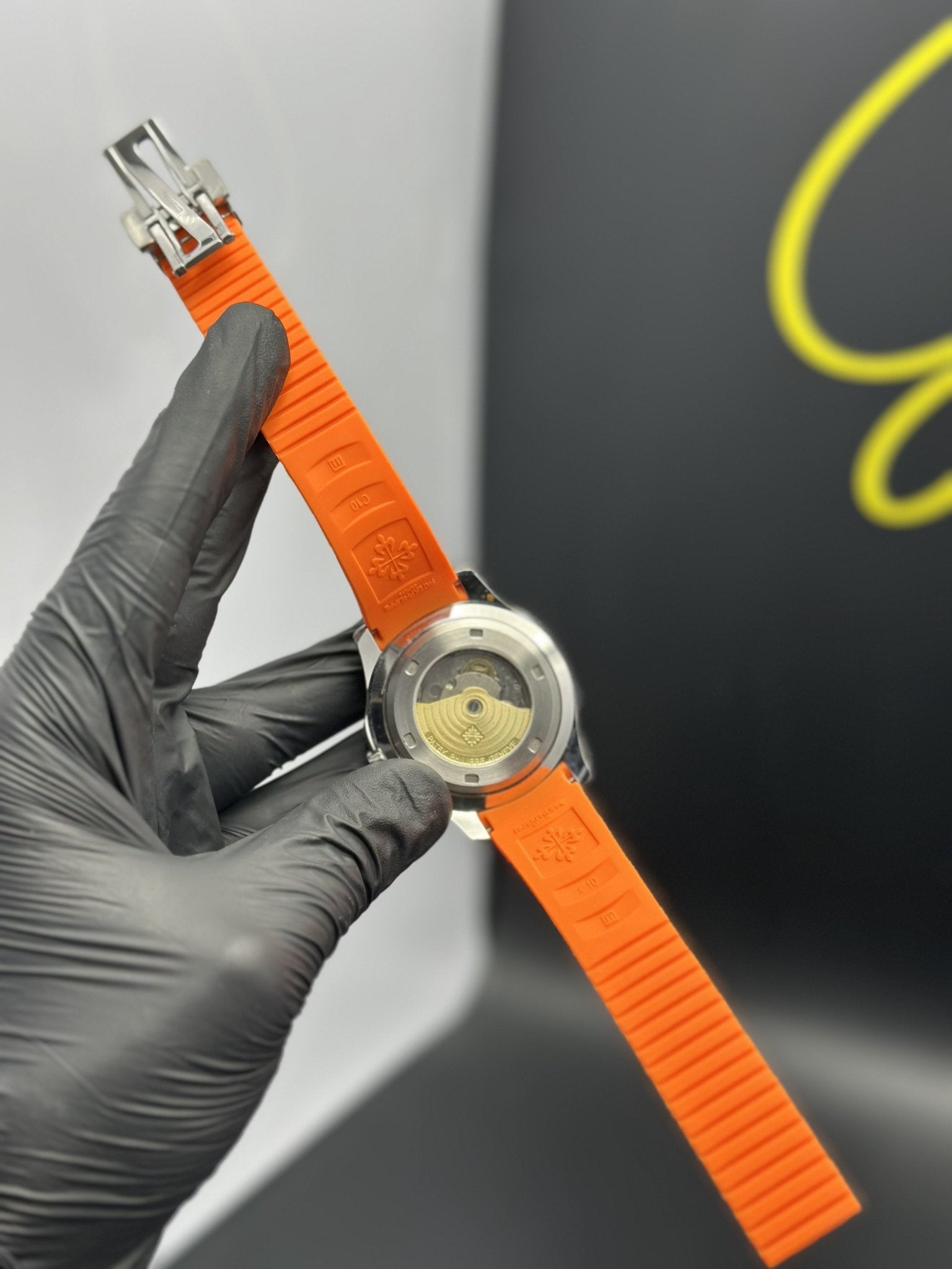Patek Philippe Aquanaut 41mm Silicone Strap Orange Strap Orange Dial Silver Bezel – men’s watch