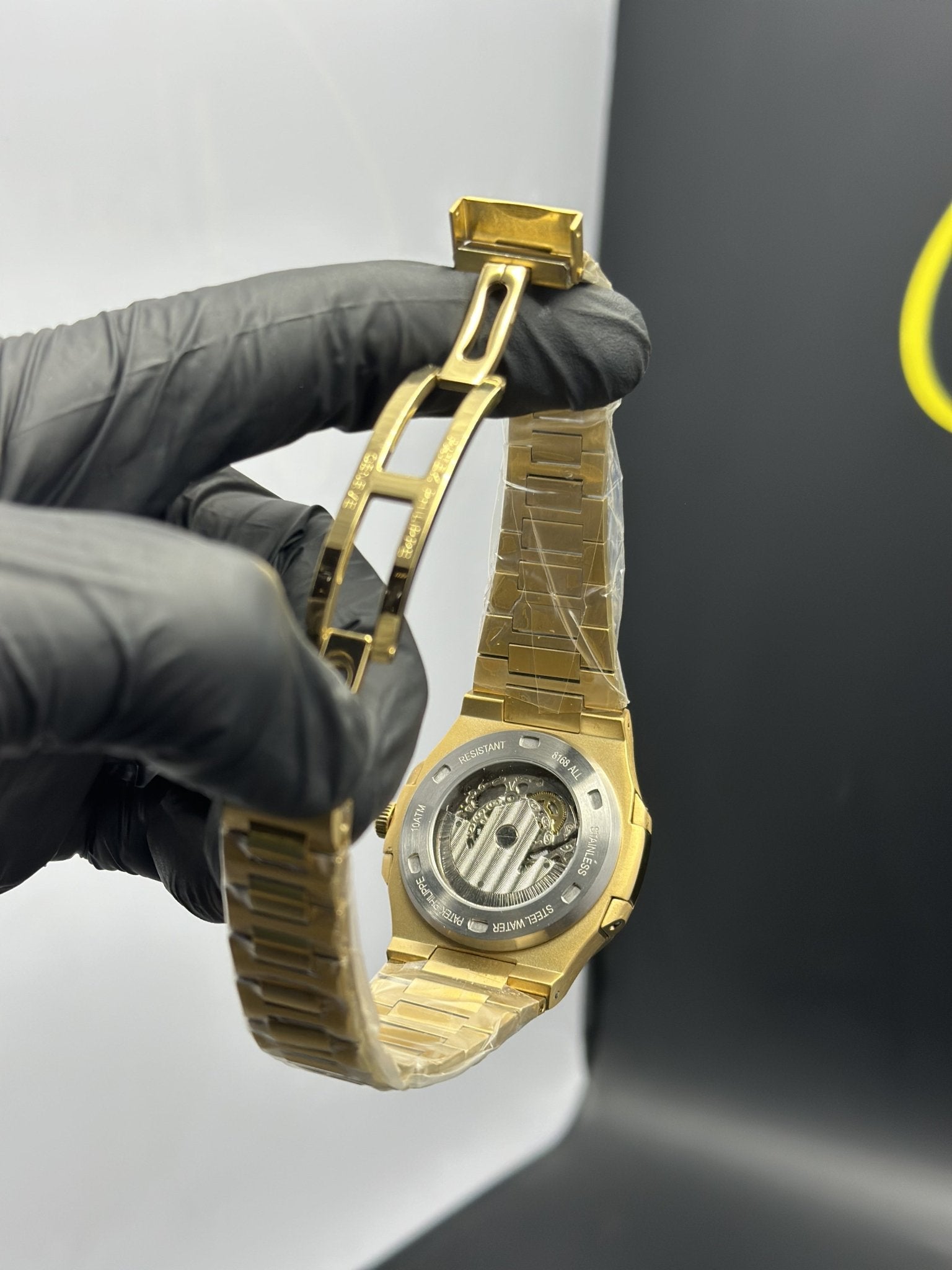 Patek Philippe Nautilus Skeleton 41mm Stainless Steel Gold Bracelet Black Dial – men’s watch