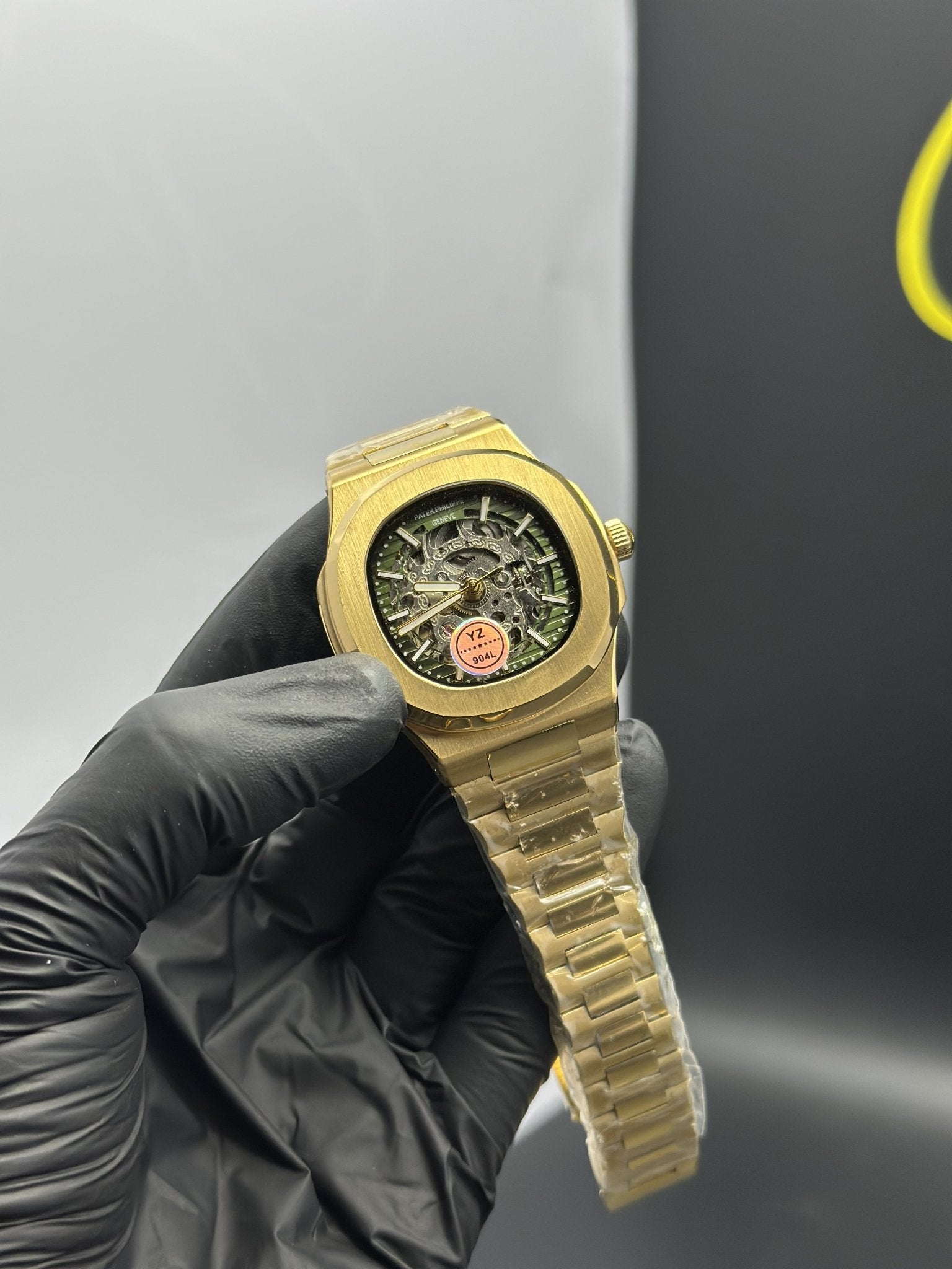 Patek Philippe Nautilus Skeleton 41mm Stainless Steel Gold Bracelet Green Dial – men’s watch