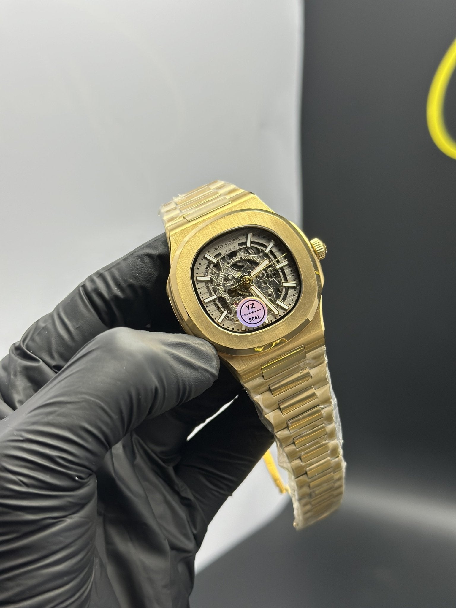 Patek Philippe Nautilus Skeleton 41mm Stainless Steel Gold Bracelet White Dial – men’s watch