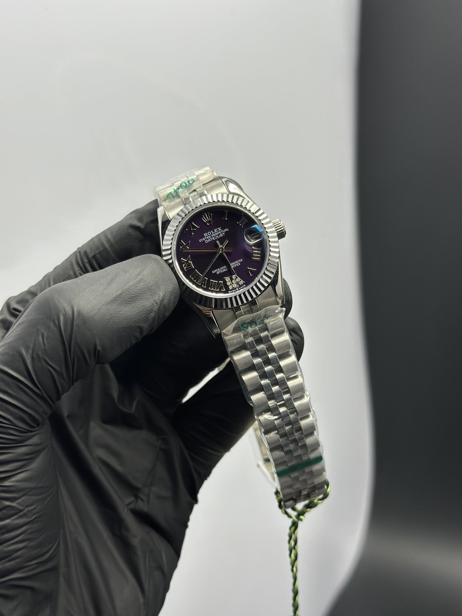 Rolex Datejust 31mm Stainless Steel Silver Jubilee Bracelet Purple Roman Figures Dial – men’s watch
