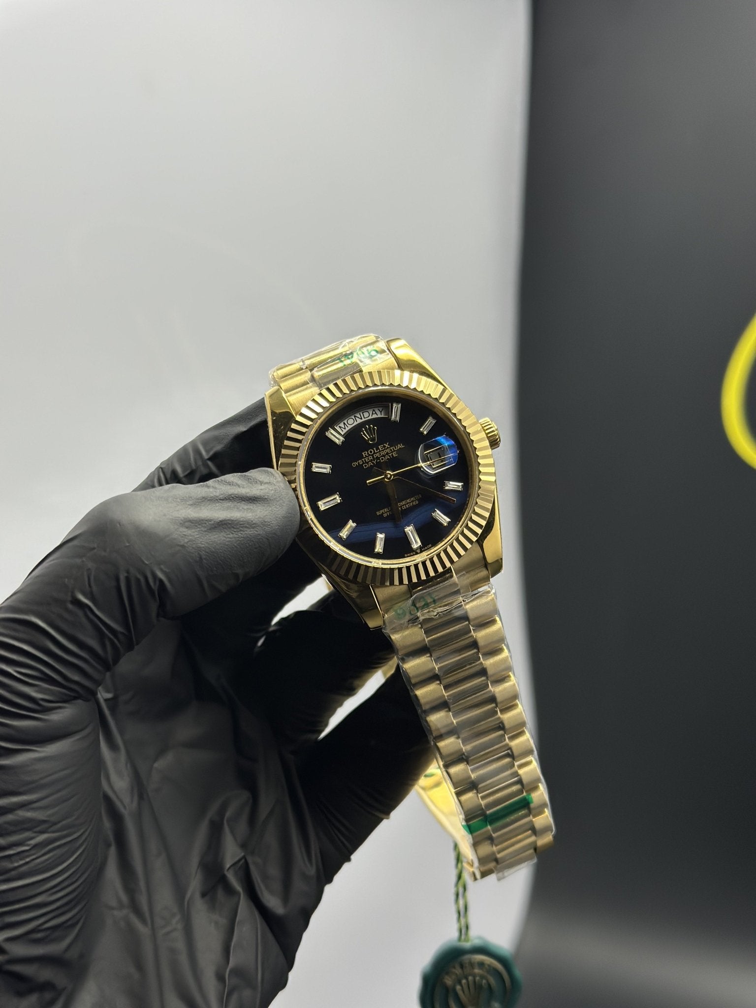 Rolex Daydate 40mm Gold Presidential Bracelet Black Gems Figures Textured Dial – men’s watch