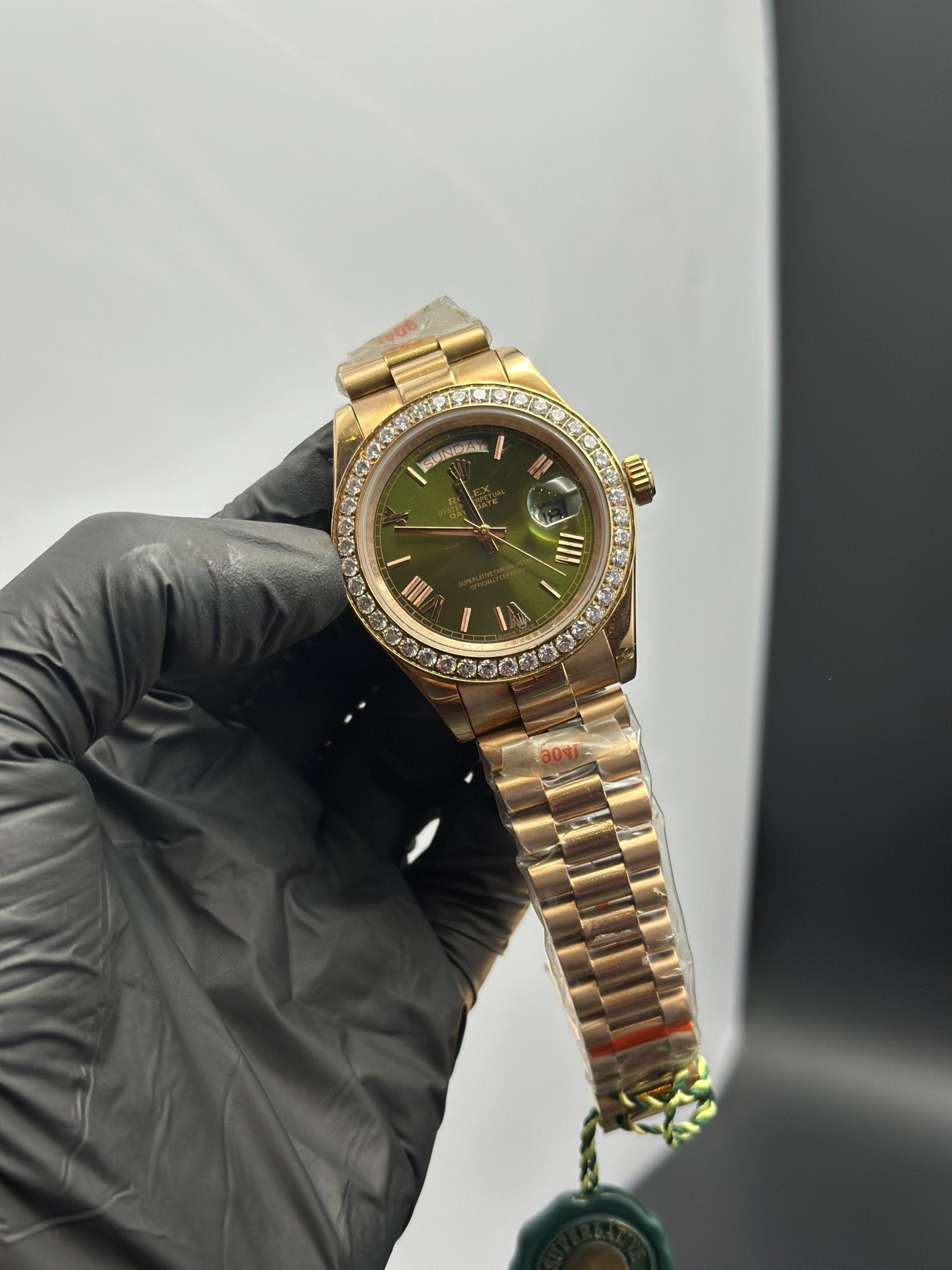 Rolex Daydate 40mm Rosegold Presidential Bracelet Stonned Bezel Olive Green Roman Dial White Stoned Bezel – men’s watch