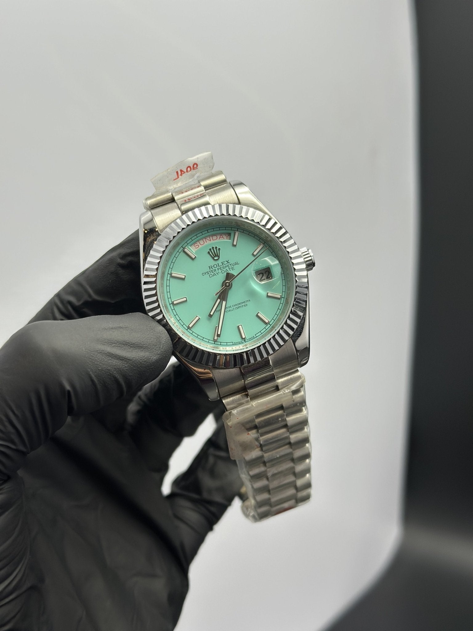 Rolex Daydate 40mm Silver Presidential Bracelet Aqua Dial – men’s watch
